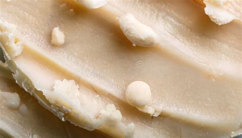 Close-up image of shea butter texture, emphasizing its creamy and smooth consistency.