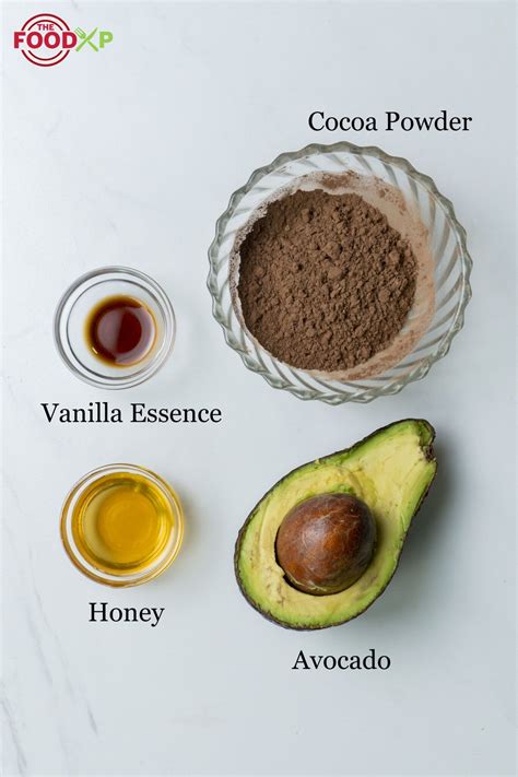 Ingredients for an anti-aging face mask: avocados, honey, cocoa powder
