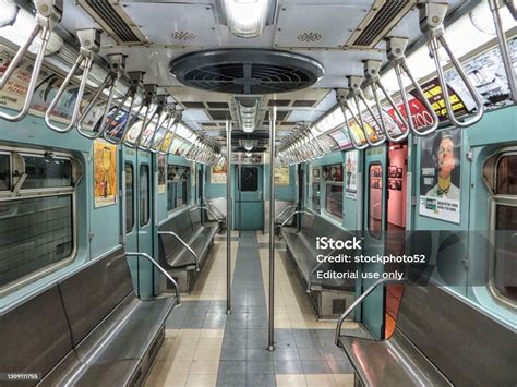 A stylized depiction of a New York City subway car interior