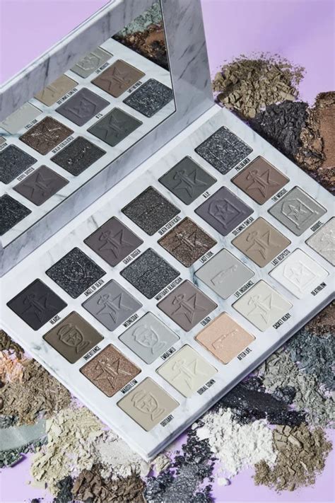 Cool-toned eyeshadow palette with grey and black shades