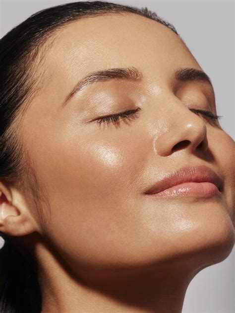 Jhené Aiko's radiant and clear skin, showcasing a natural, healthy glow.