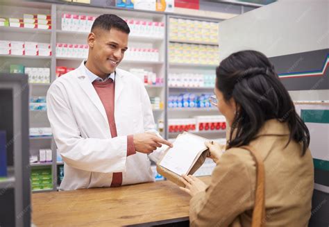 Image of a doctor and pharmacist discussing a patient's prescription