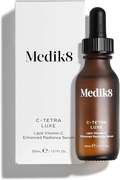Image showcasing the dewy and luminous finish on skin after applying Medik8 C-Tetra Luxe serum.