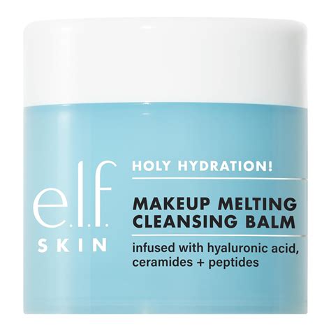 Demonstration of e.l.f. Holy Hydration Cleansing Balm melting makeup on the back of a hand.