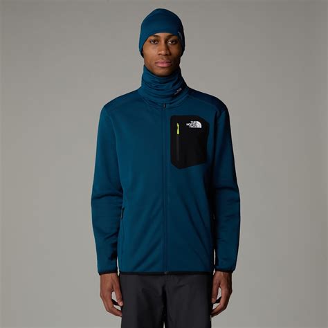 Diagram illustrating the key features of The North Face Crest Full-Zip Jacket, highlighting the full-zip closure, chest pocket, hand pockets, and stand collar.