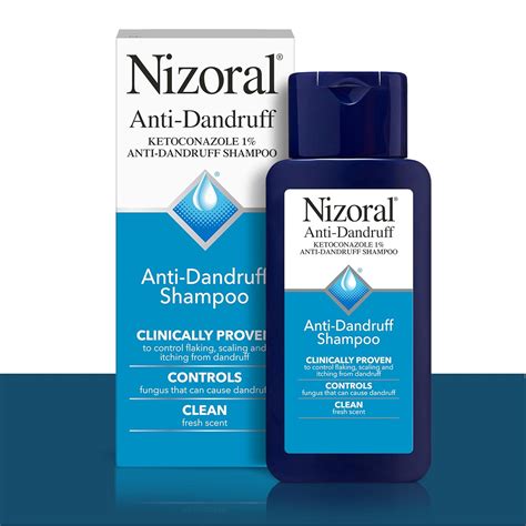 A bottle of Nizoral Anti-Dandruff Shampoo with lather to demonstrate its texture.