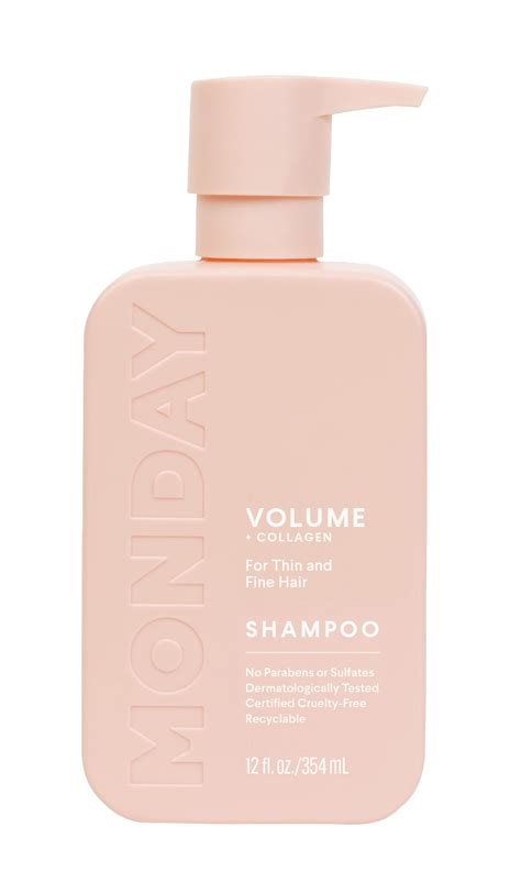 A bottle of Monday Haircare Thinning Shampoo with a focus on its lather.