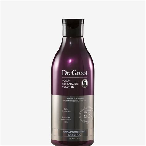 A bottle of Dr. Groot Scalp Revitalizing Solution Hair Thickening Shampoo with a focus on its rich lather.