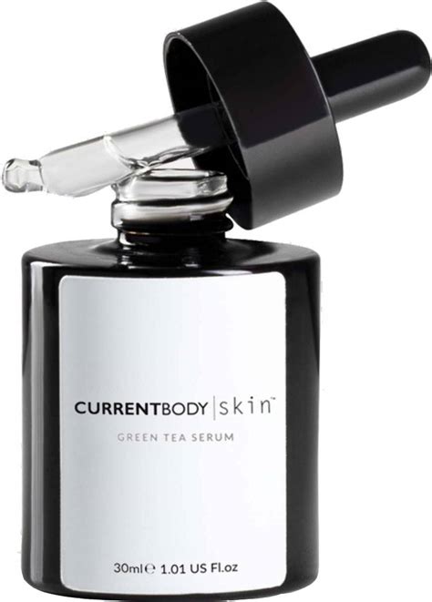 A visually appealing shot of the CurrentBody Skin Green Tea Serum bottle, possibly with a subtle green tea leaf motif in the background.