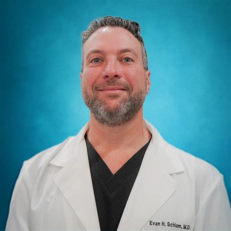 Headshots of Dr. Evan Schlam and Dr. Edward Schlam.