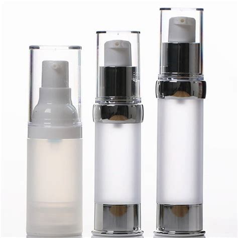 An opaque bottle of vitamin C serum with an airless pump dispenser.