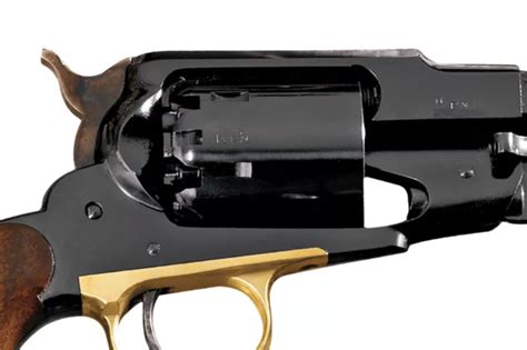 Side-by-side comparison of a Colt-style and a Remington-style black powder revolver, highlighting the top strap