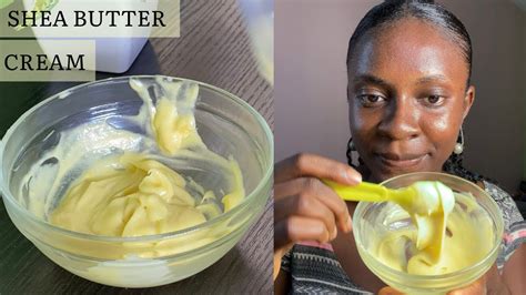 Close-up photo of hands with a thick layer of a cream mask, showcasing nourishing ingredients like shea butter and apricot.