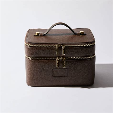 Étoile Collective Duo Vanity Case opened to show its two-tier organization system and brush holders