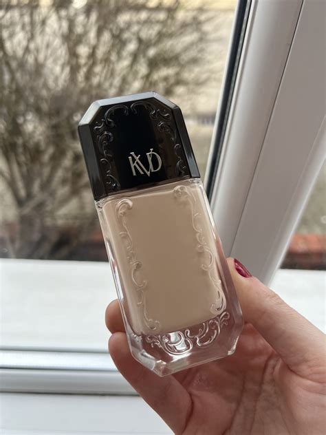 Packaging of the KVD Beauty Good Apple foundation, showcasing its luxurious design.