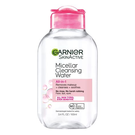 Image showcasing a selection of different types of cleansers: oil, balm, micellar water, gel, and foam.
