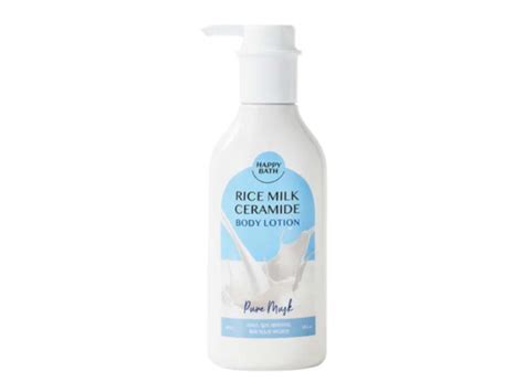 A bottle of Happy Bath Rice Milk Ceramide Body Lotion with a soft, milky texture and subtle branding.