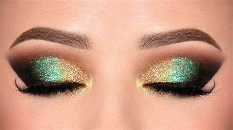 Close-up of eye makeup showing the blend of green and gold pigments.