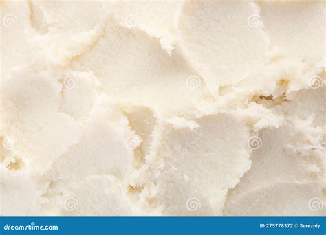 Close-up of shea butter texture and blueberries