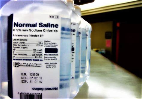 Infographic showing the precise ratio of salt to water in normal saline solution.