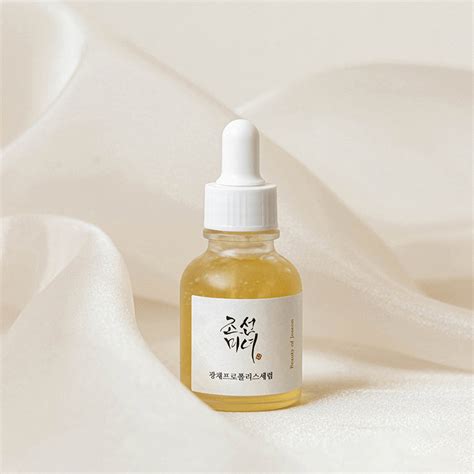 A visually appealing bottle of Beauty of Joseon Glow Serum, showcasing its golden hue and luxurious texture.